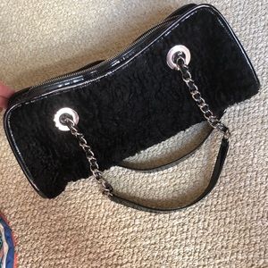 Faux fur patent leather bag. Trina Turk